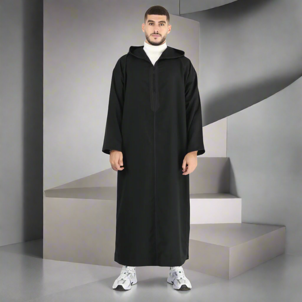 Man wearing a black abaya on a white background
