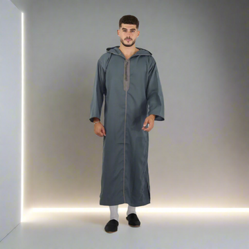 Man wearing a long gray robe on a white background