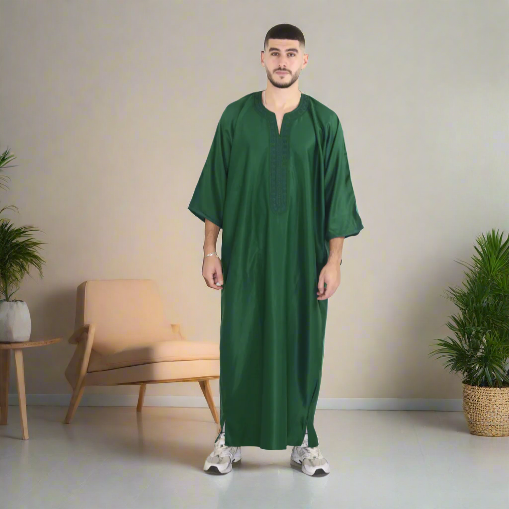 Man wearing a green robe on a white background