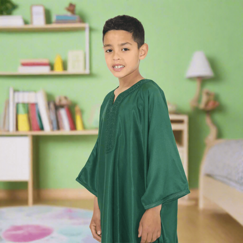 Child wearing a green traditional outfit on a white background