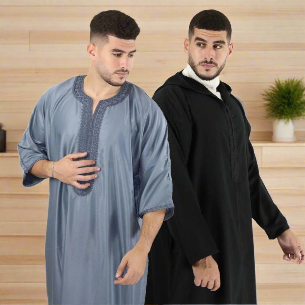 Two men wearing traditional outfits, one in light blue and the other in black, on a white background.